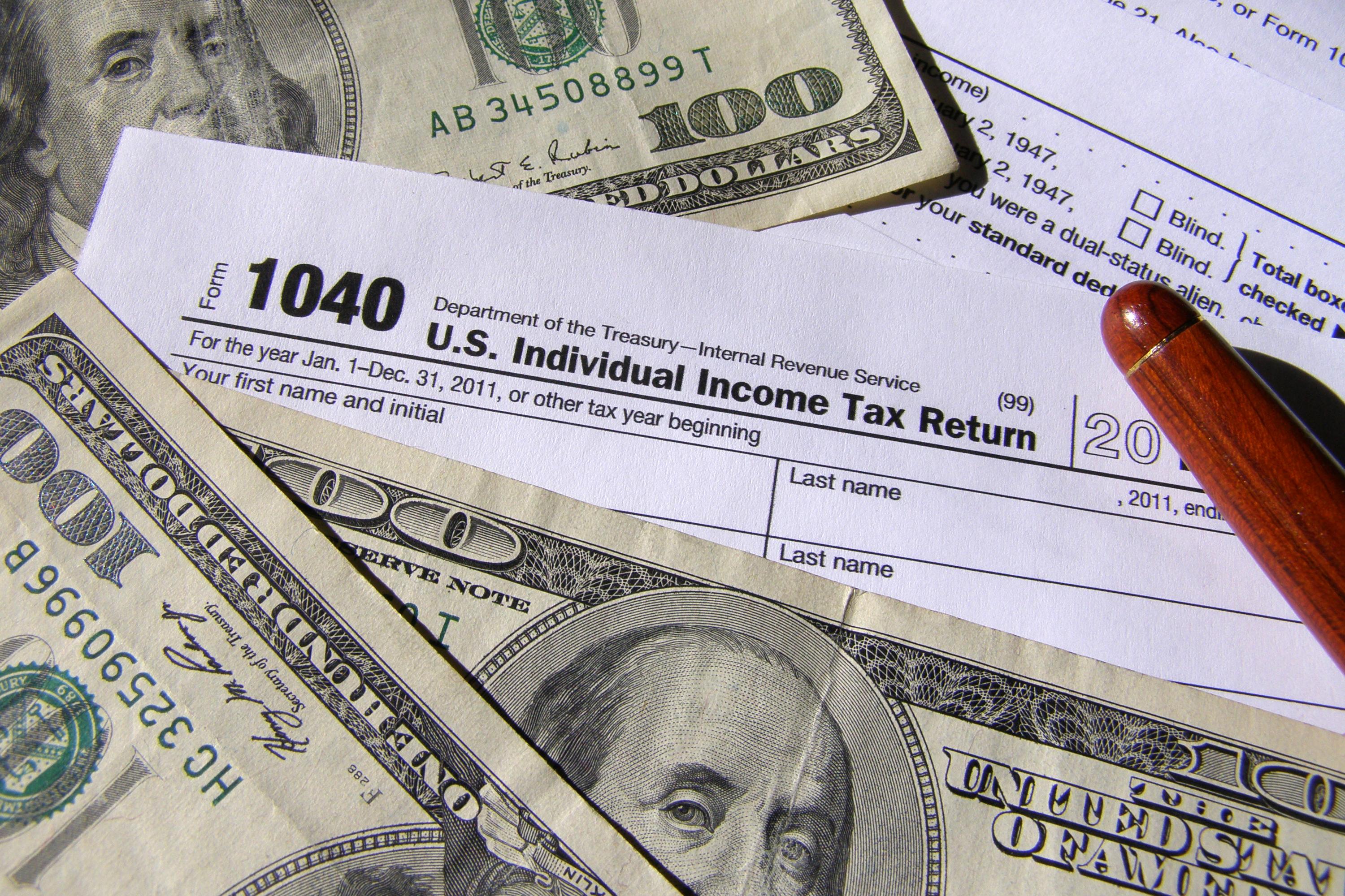 Money and tax forms (Flickr)