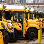 Denver Public Schools buses at their home off Federal Boulevard, Dec. 14, 2019. (Kevin J. Beaty/Denverite)