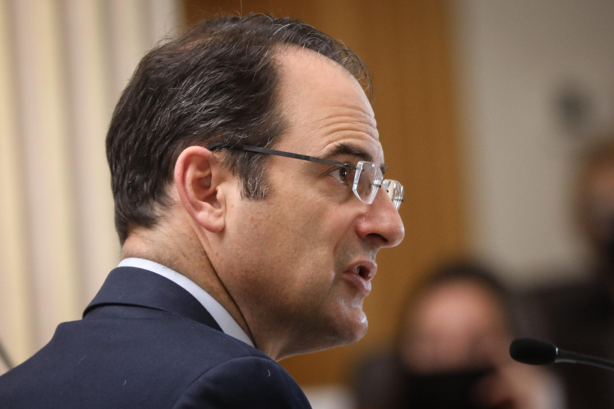 Colorado Attorney General Phil Weiser turned to his right facing away from the camera