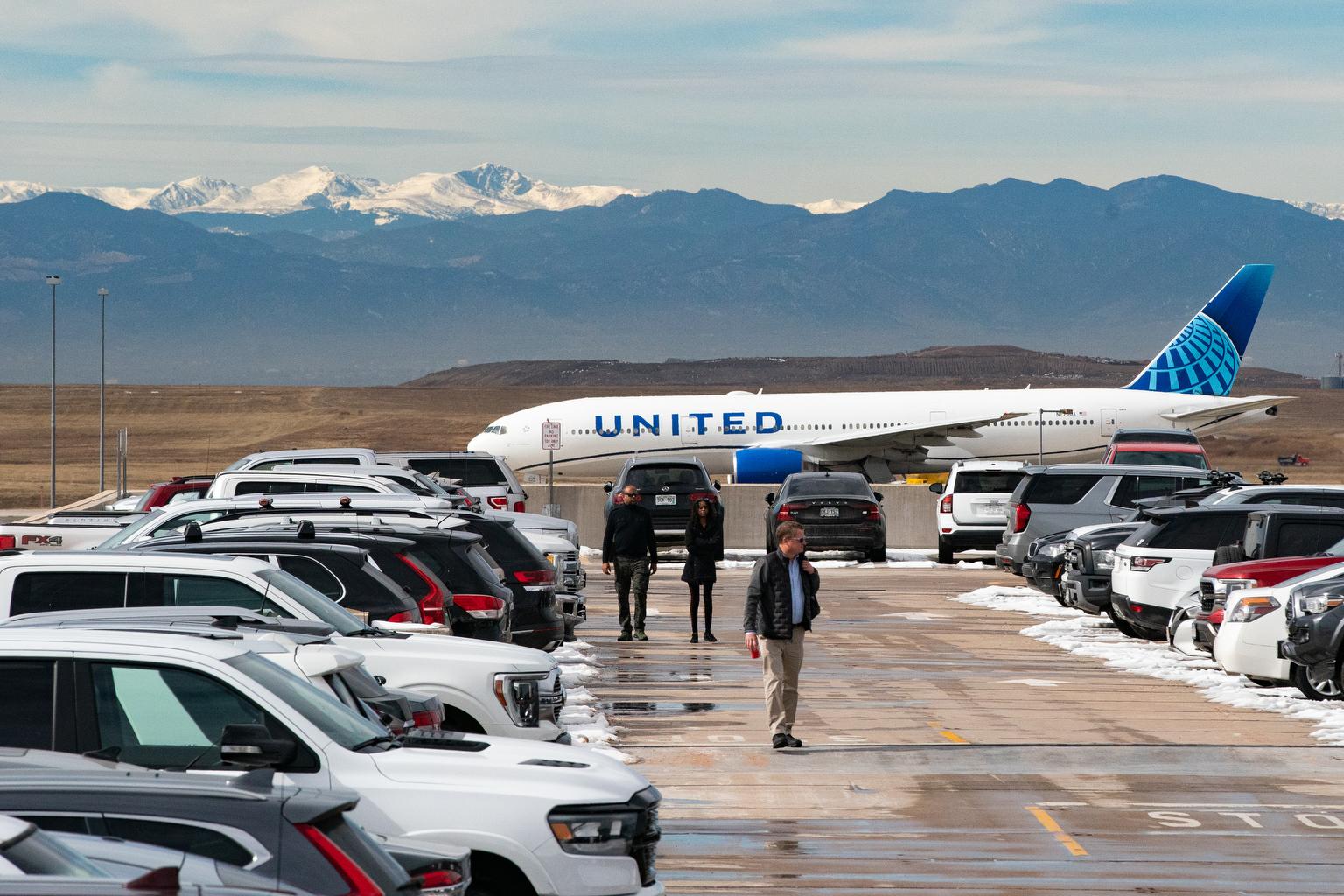 DIA AIRPORT JET, PARKED CARS