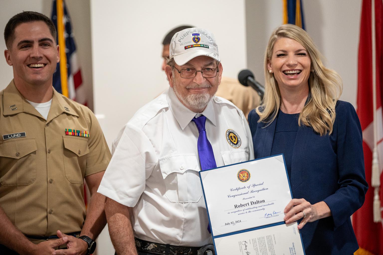 U.S. Army Vietnam Veteran Robert Dalton holds his Certificate of Special Congressional Recognition