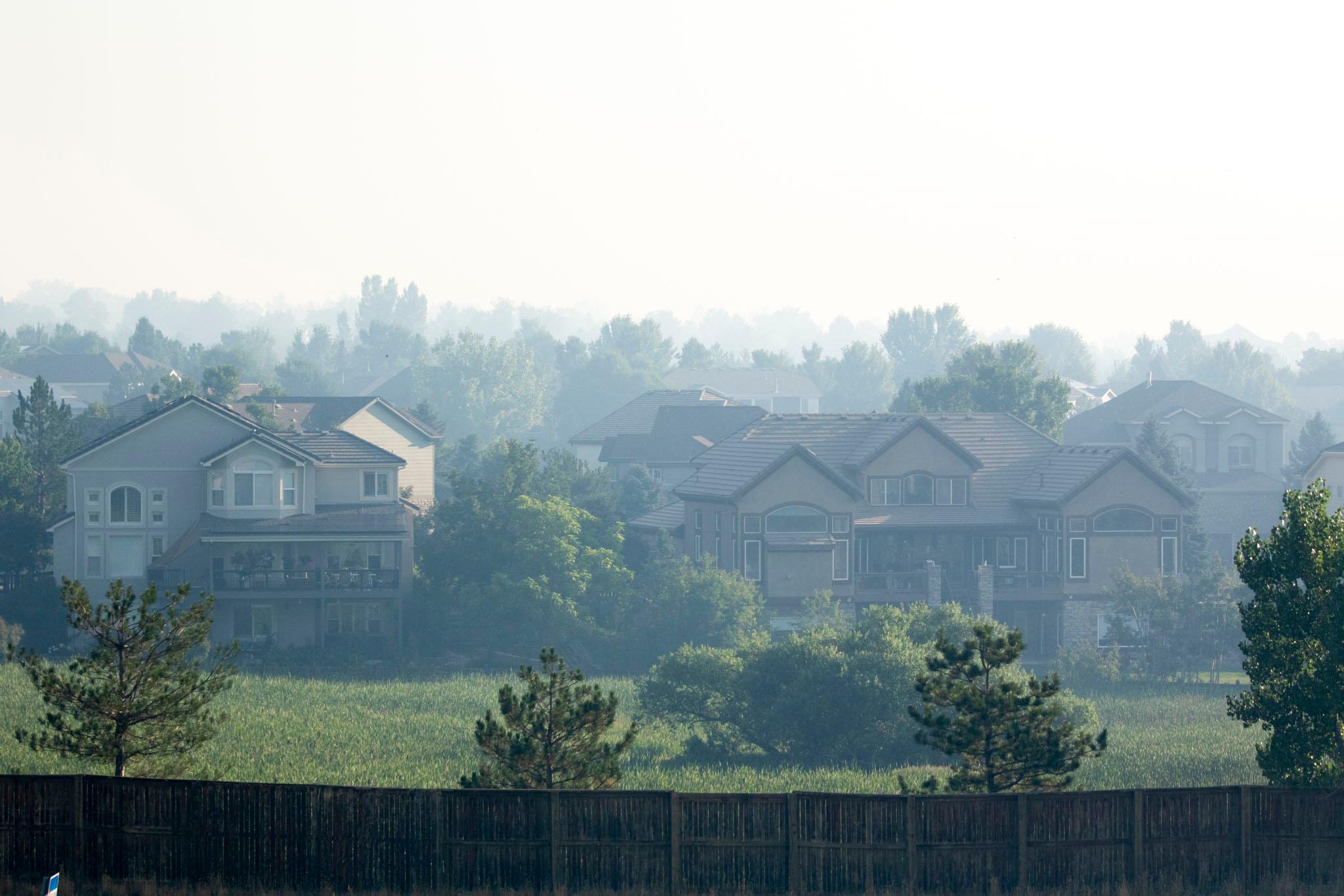 Smoke from the Quarry fire hangs over Jefferson County's Meadow Ranch neighborhood.