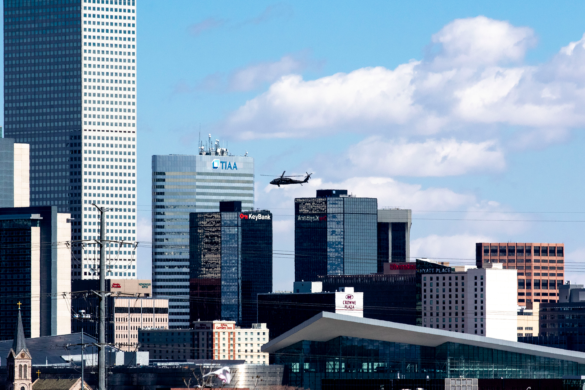 A blackhawk helicopter flies over Denver