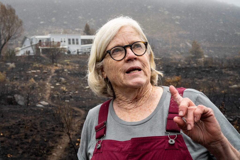 Suzanne Simmons on the burn scar near her home in Stone Canyon