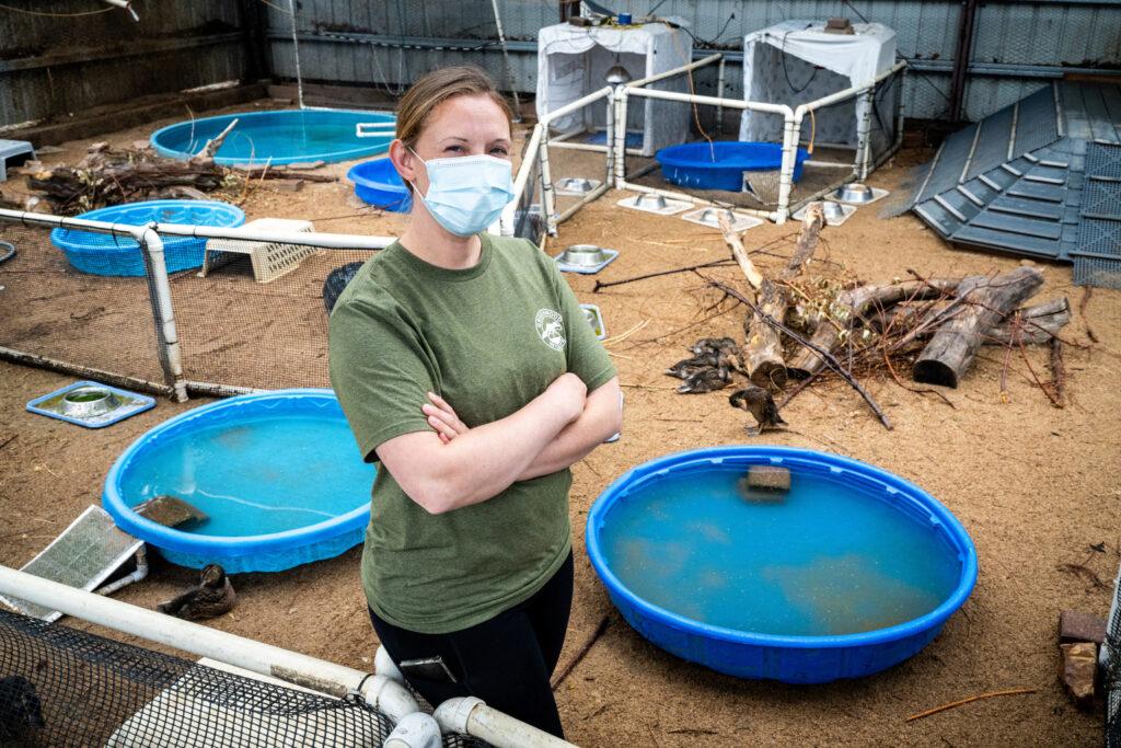 Amanda Manoa stands on “The Beach” at the Greenwood Wildlife Rehabilitation Center in Lyons