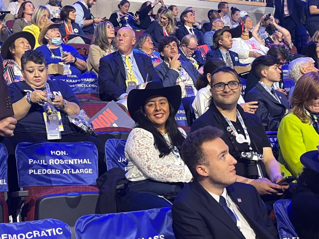 Colorado delegate Jasmin Ramirez sits in the audience at the 2024 DNC in Chicago.