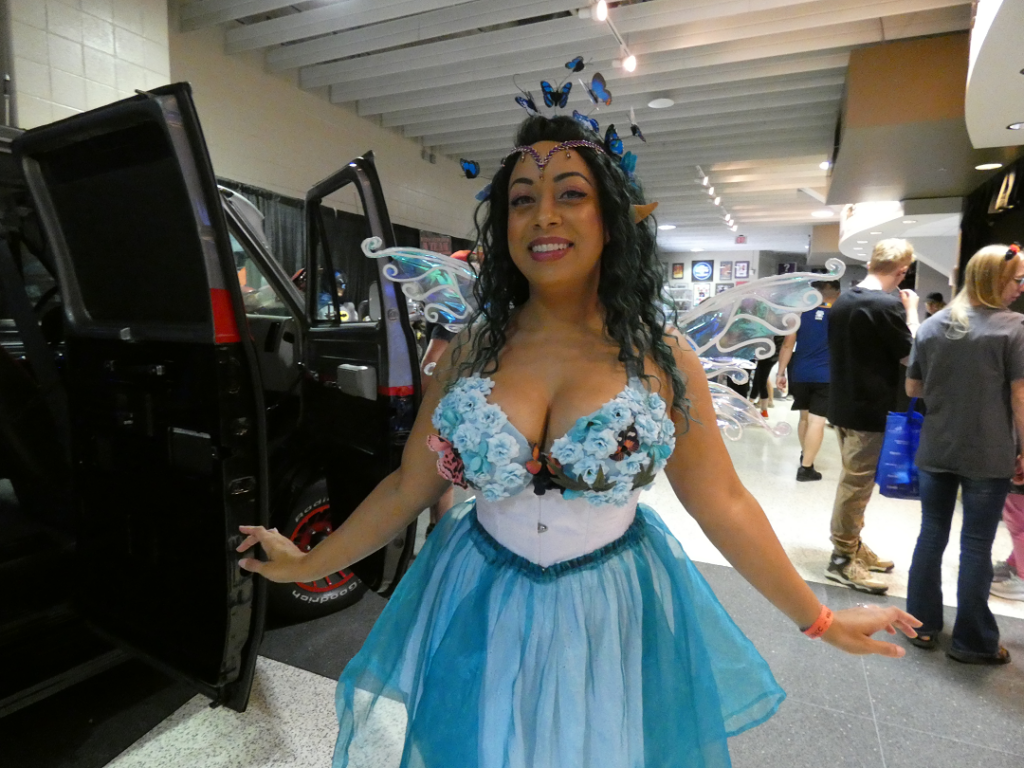 Woman in blue fairy costume.