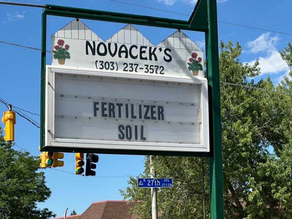 A sign at the entrance of Novacek's Greenhouse in Golden.