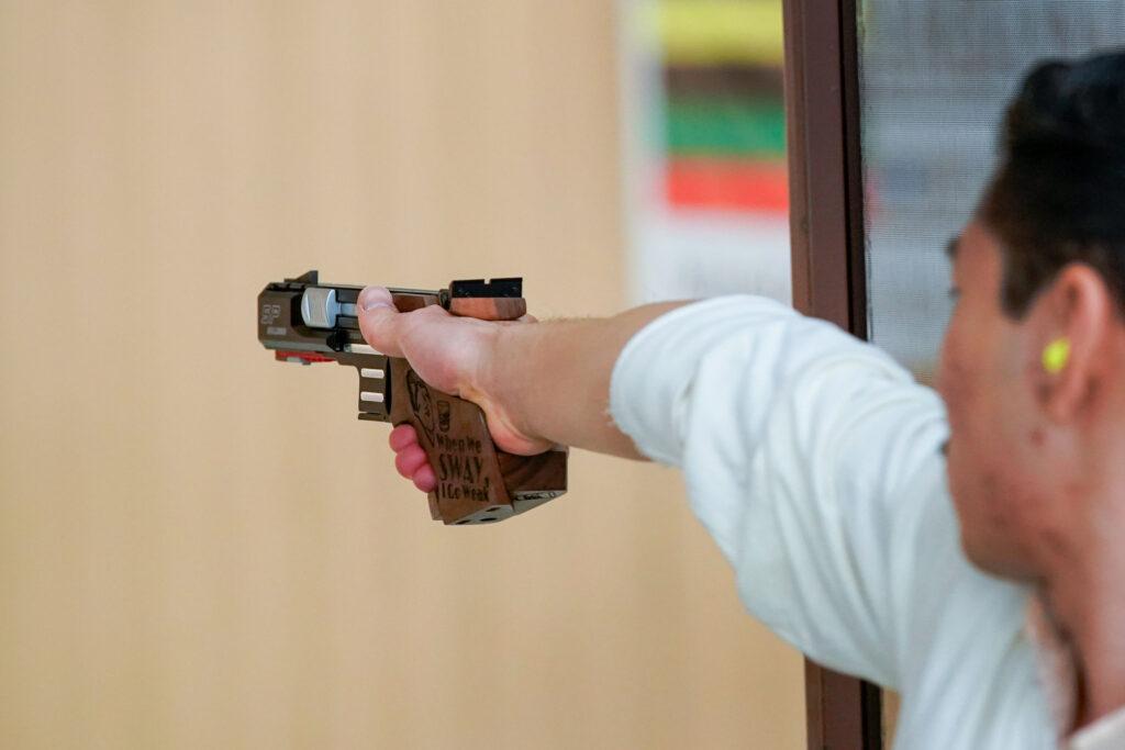 YanXiao Gong practices Para Pistol at the U.S. Olympic and Paralympic Training Center