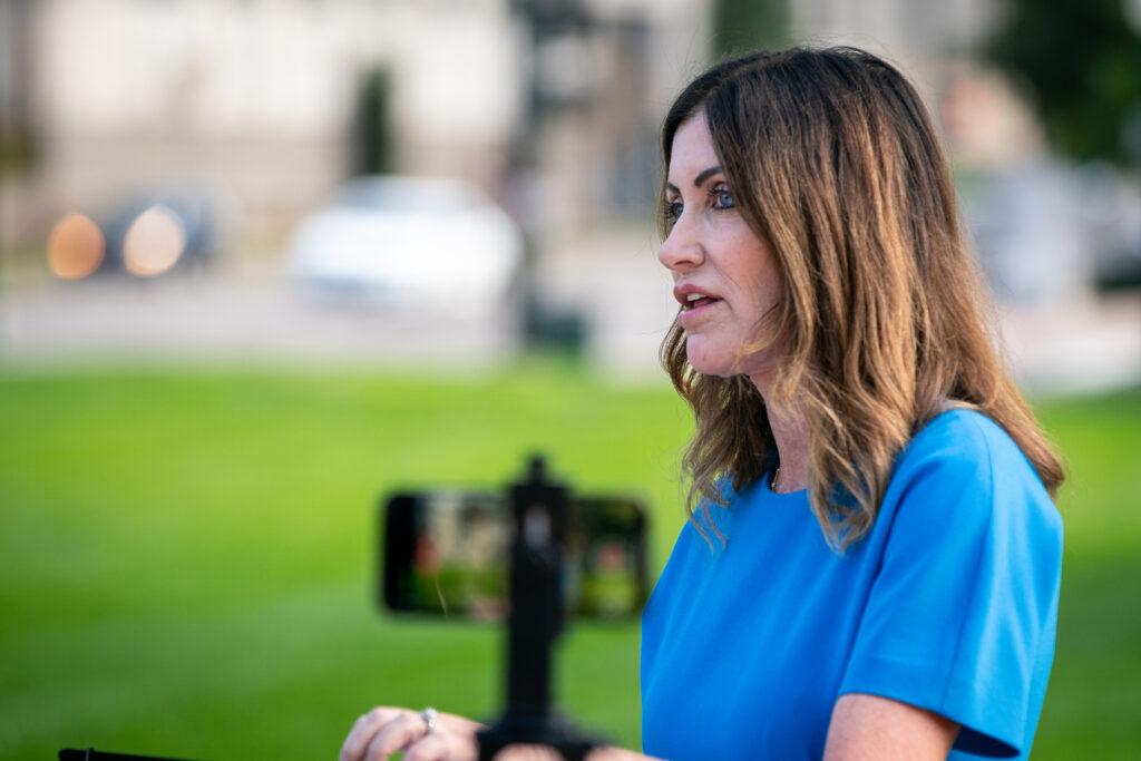 Heidi Ganhal talks about ballot security at a press conference