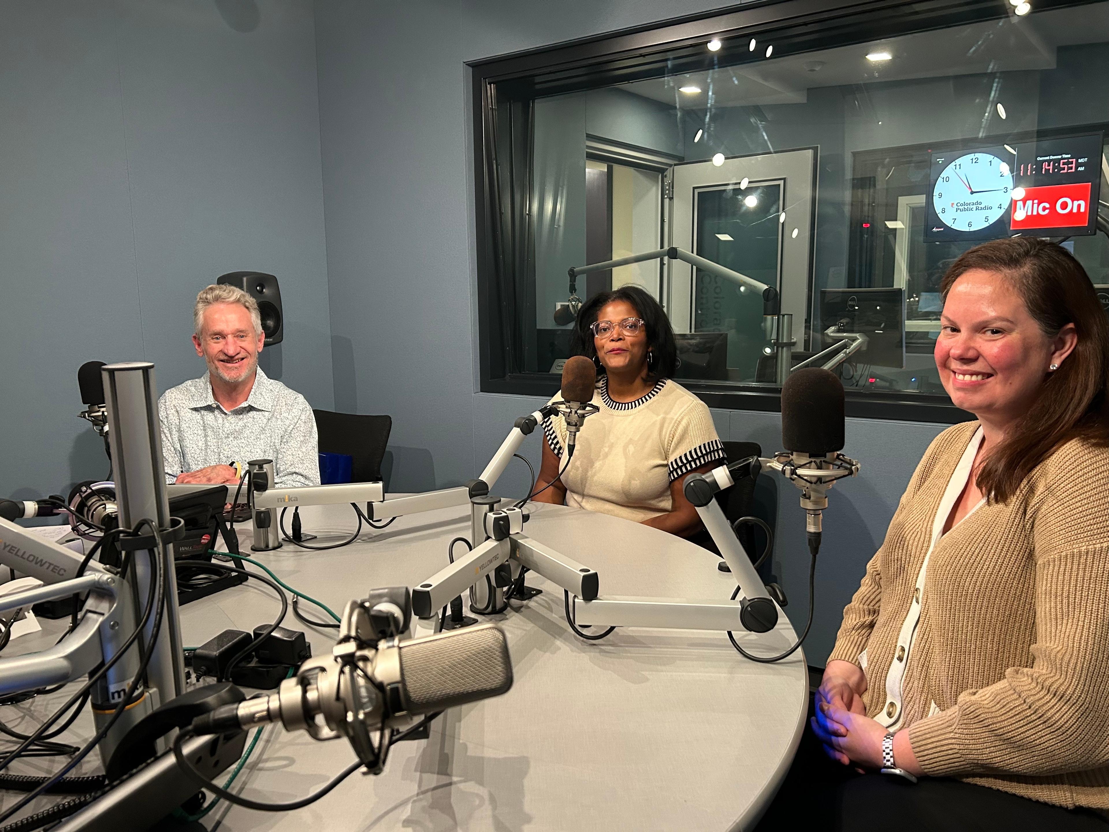 Three parents in the CPR News studio talking about the causes of parental anxiety and ways to cope.