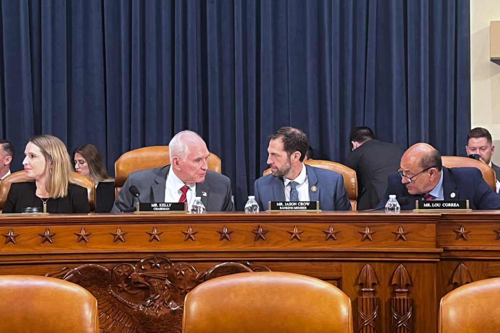 Rep. Mike Kelly, R-Pa. speaks with Rep. Jason Crow at the first public hearing of a bipartisan congressional task force investigating the assassination attempts against former President Donald Trump