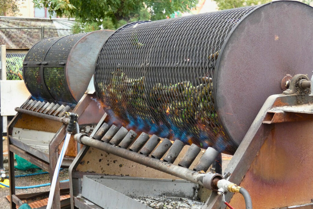 Chiles roasting in metal cages