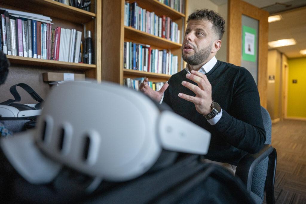 Media studies doctoral candidate Naim Aburaddi in his office