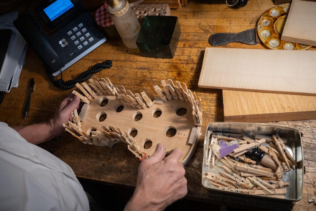 Wood shaped to form the body of a violin