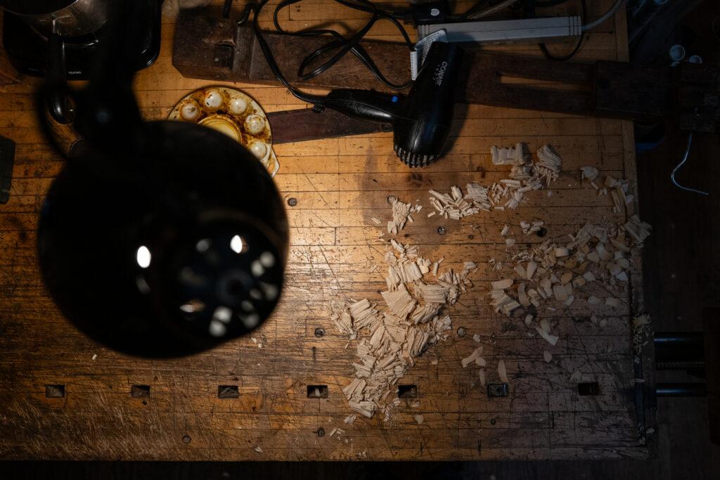 Wood shavings on the violin workbench