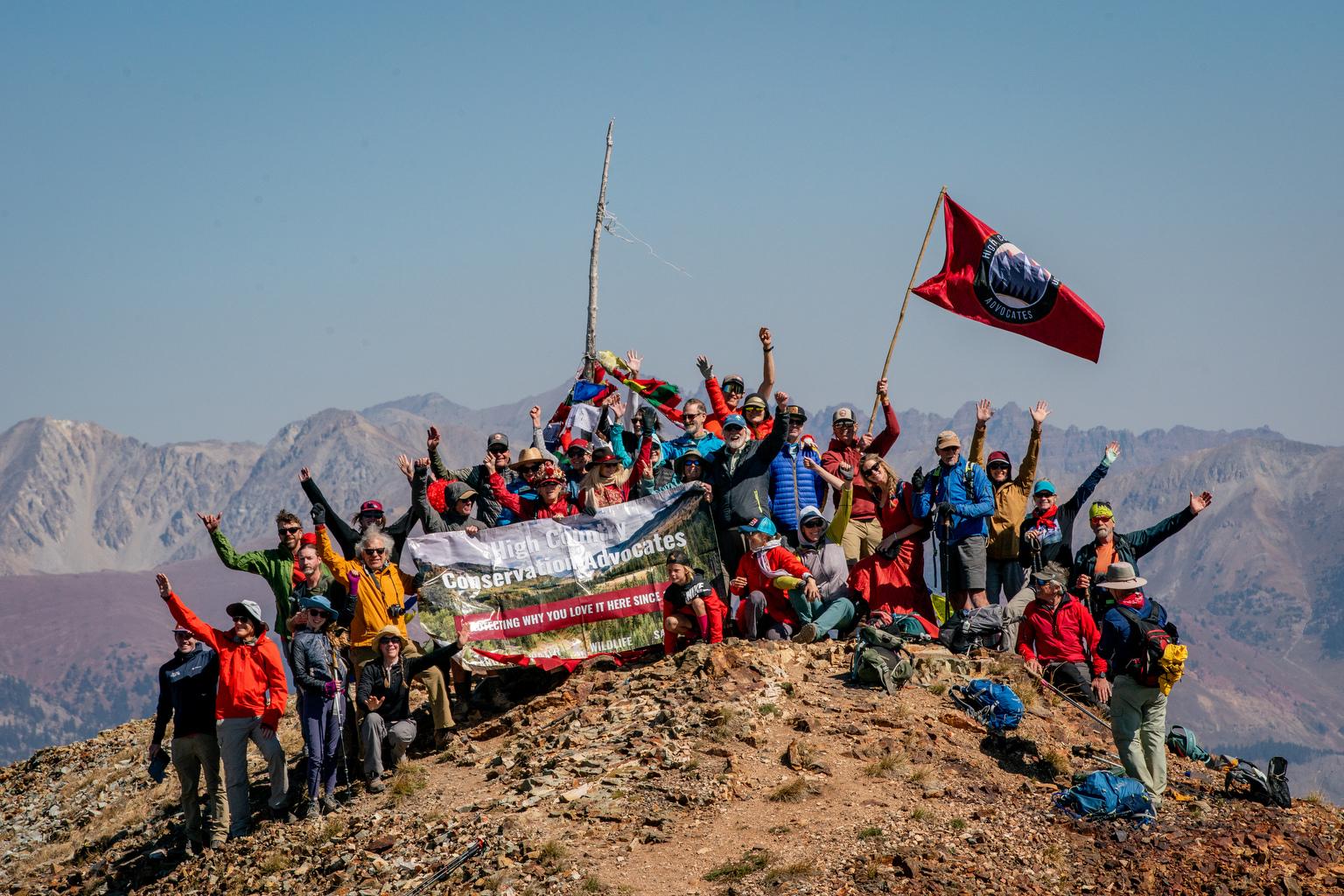 Opponents of molybdenum mining on Mt. Emmons above Crested Butte assemble oin the summit for a portrait