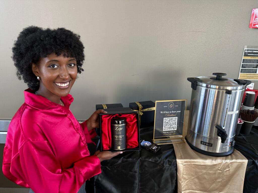 A student shows off coffee