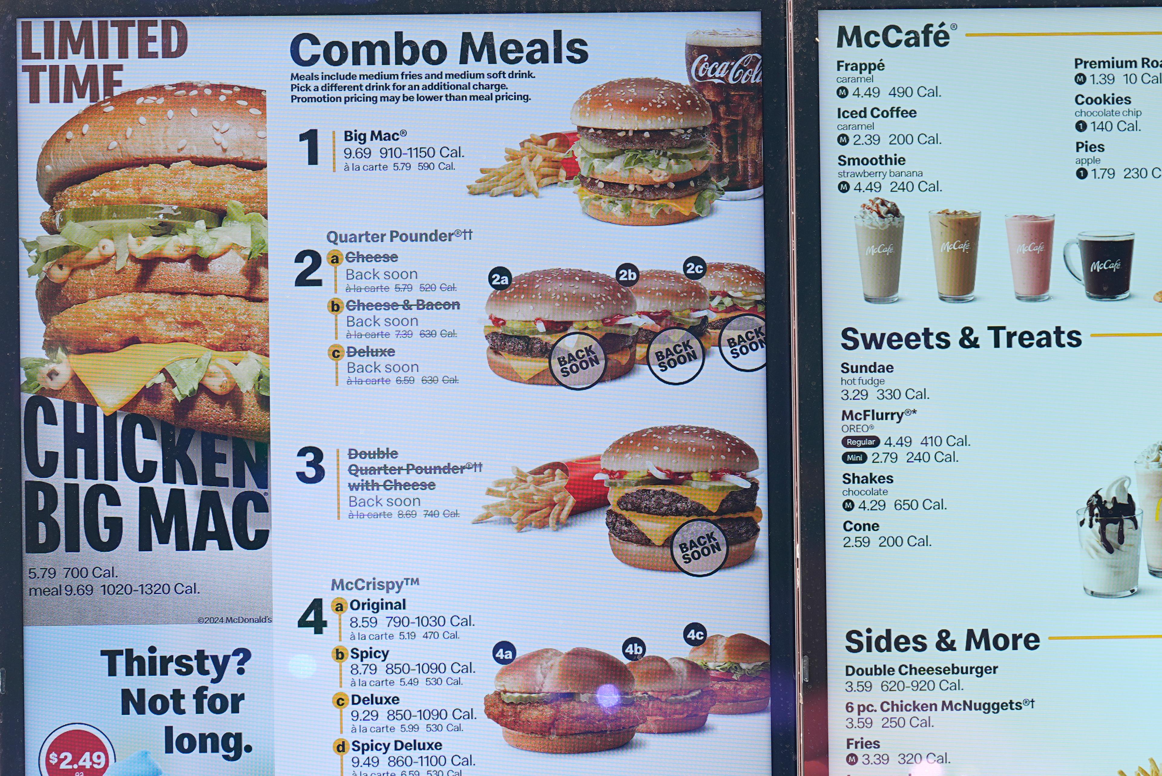 An electronic menu board at McDonald's shows several hamburgers not for sale.