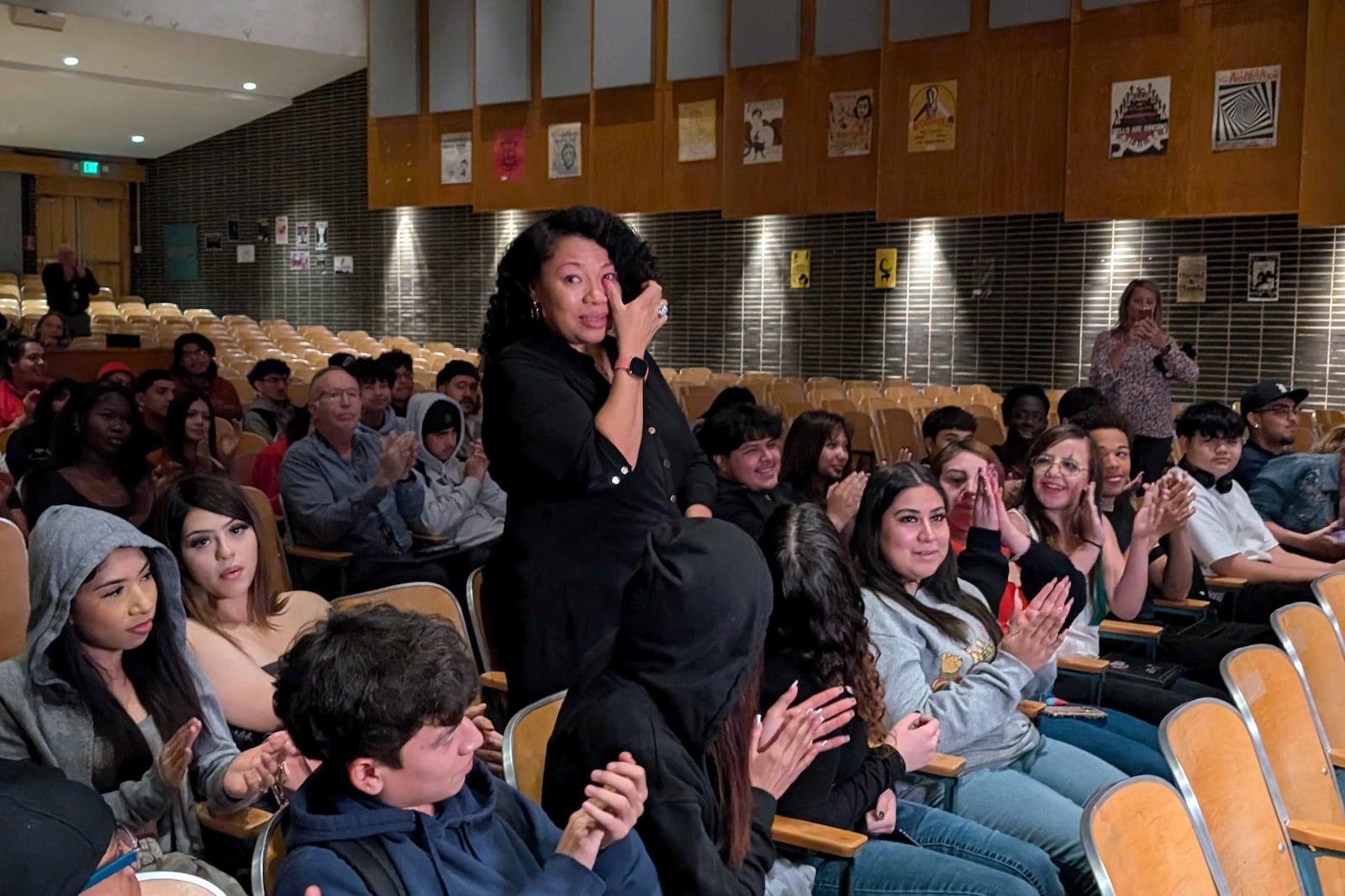 Janet Damon wipes a tear after learning that she was chosen as Colorado's Teacher of the Year