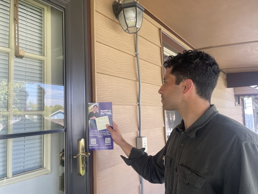 Democratic state Rep. Manny Rutinel campaigning in Commerce City