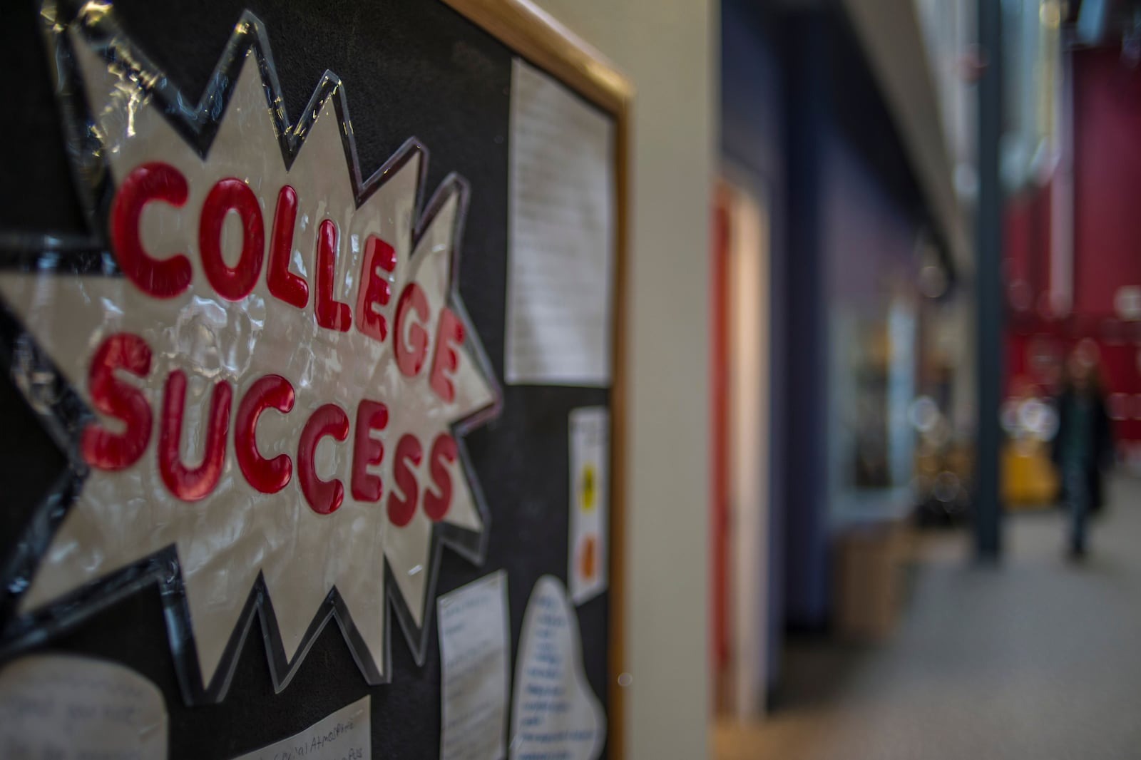 A bulletin board with a sign saying "college success" at an unnamed school