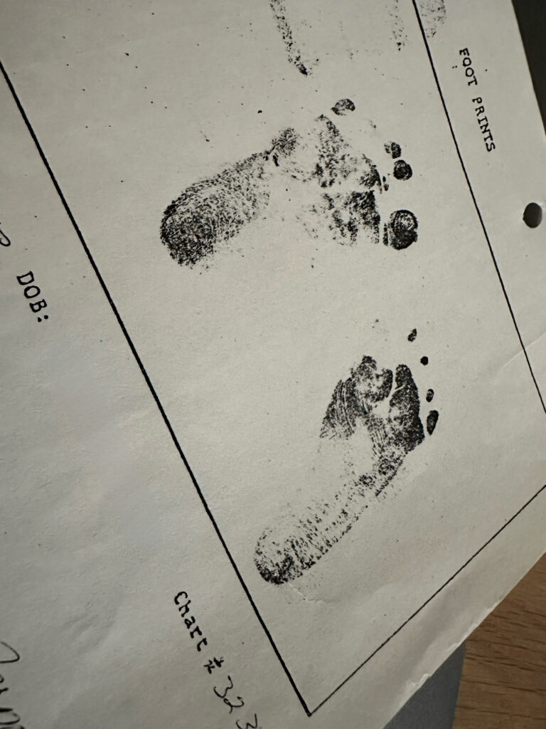 A piece of paper with footprints imprinted on it.