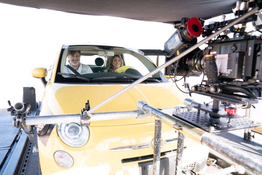 Actors Jeremy Swift and Natalie Gold are seen sitting inside a car for a scene in the movie, &quot;Welcome to the Fishbowl.&quot;