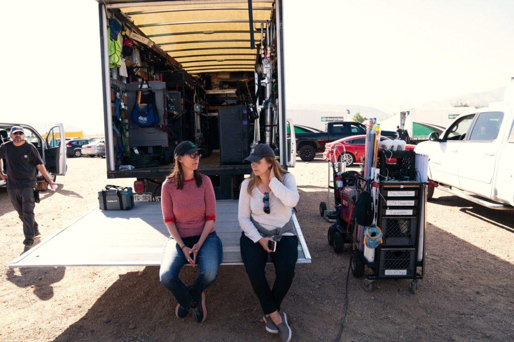 Two women are seen sitting on the back of a production truck on the set of the movie, &quot;Welcome to the Fishbowl&quot; which was shot in Colorado. The two women are Director/Co-writer Sheryl Glubok and Producer Iana Dontcheva.