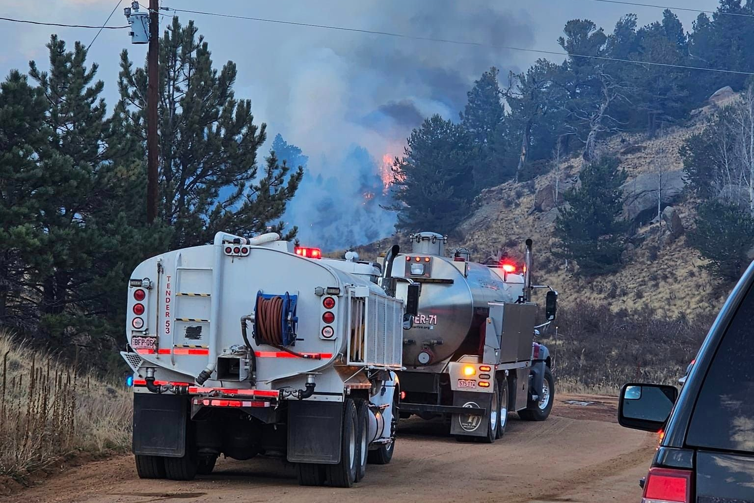 Firefighters respond to the Highland Lakes fire in Teller County.