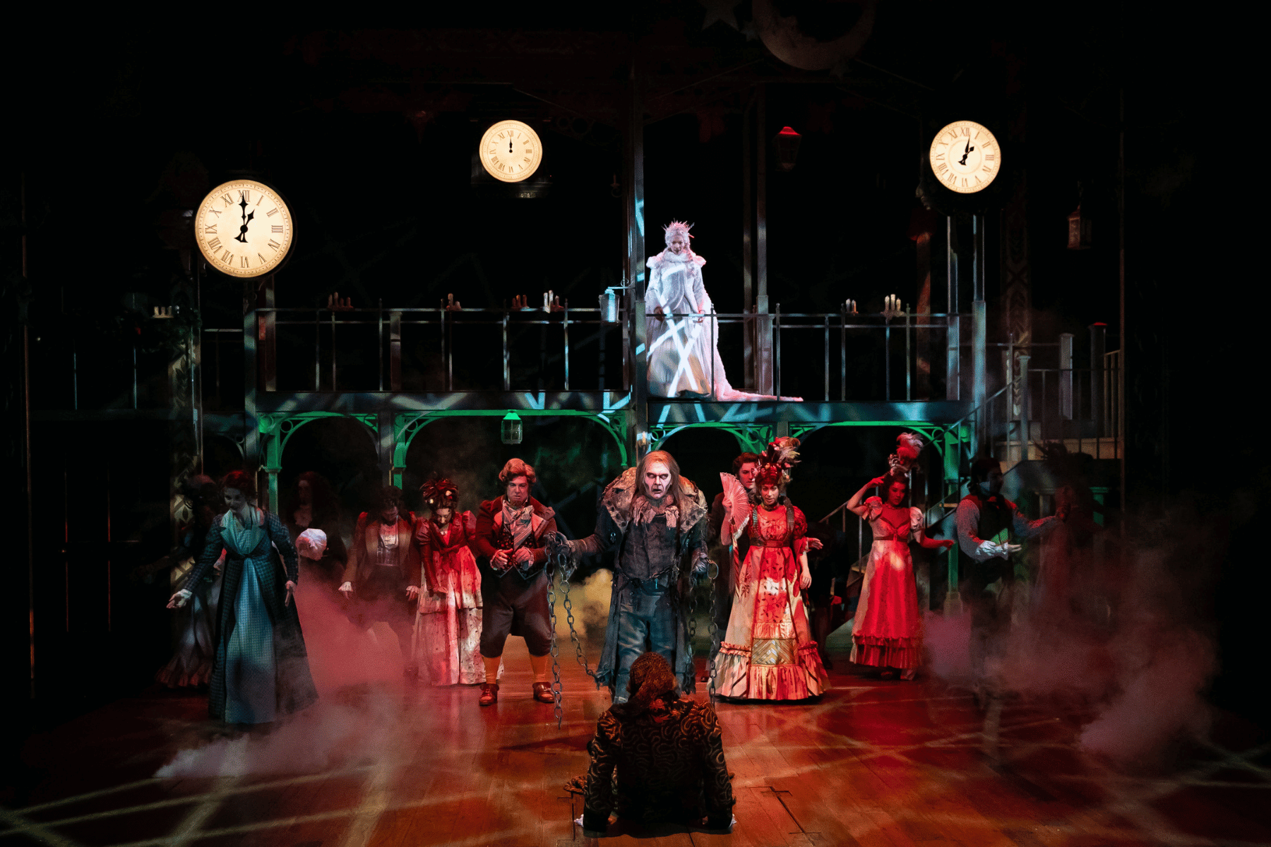 A dramatic scene from A Christmas Carol at the Denver Center, showcasing the haunting atmosphere and stunning visuals.