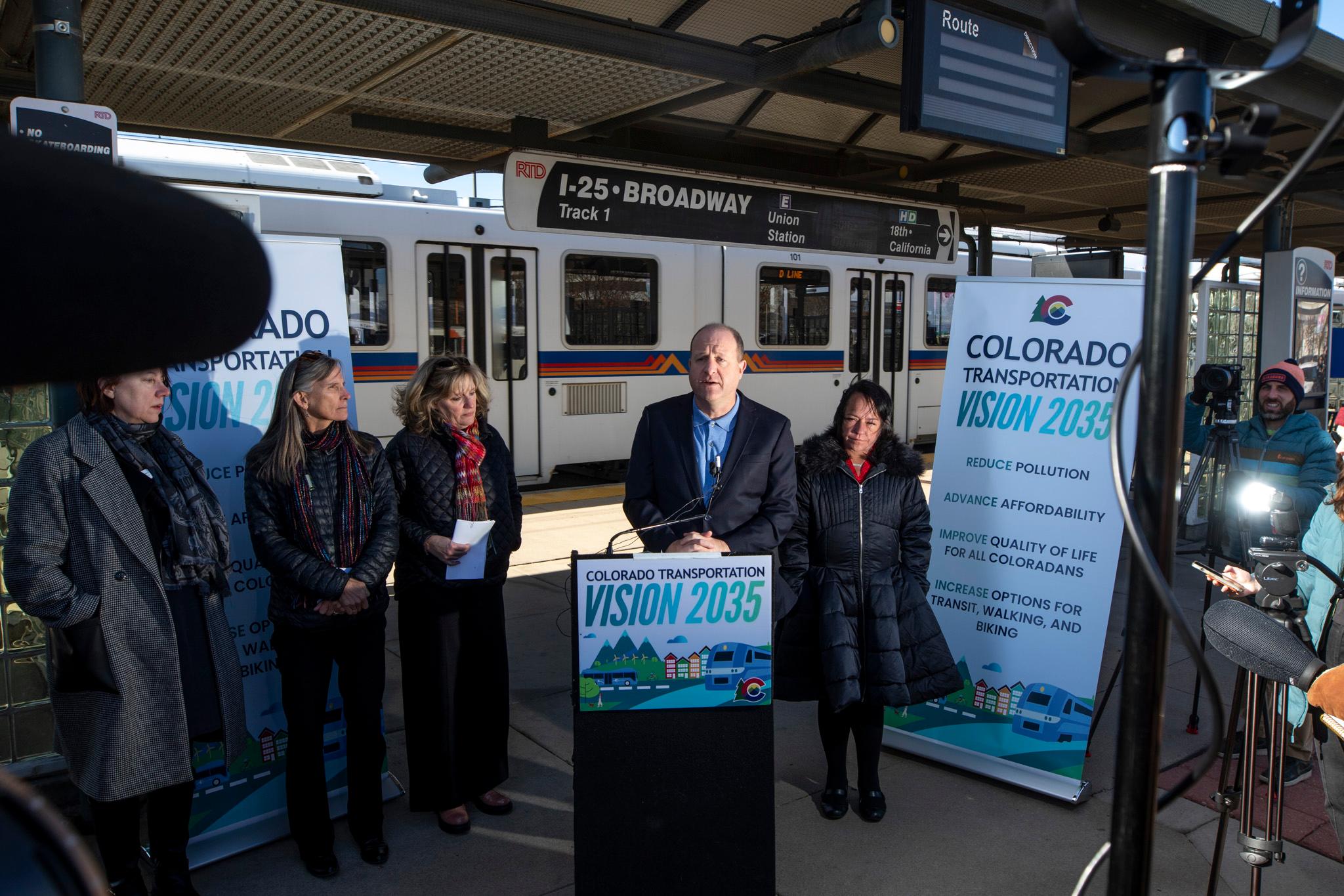 Gov. Jared Polis announces a new transportation vision plan at RTD's Broadway Station