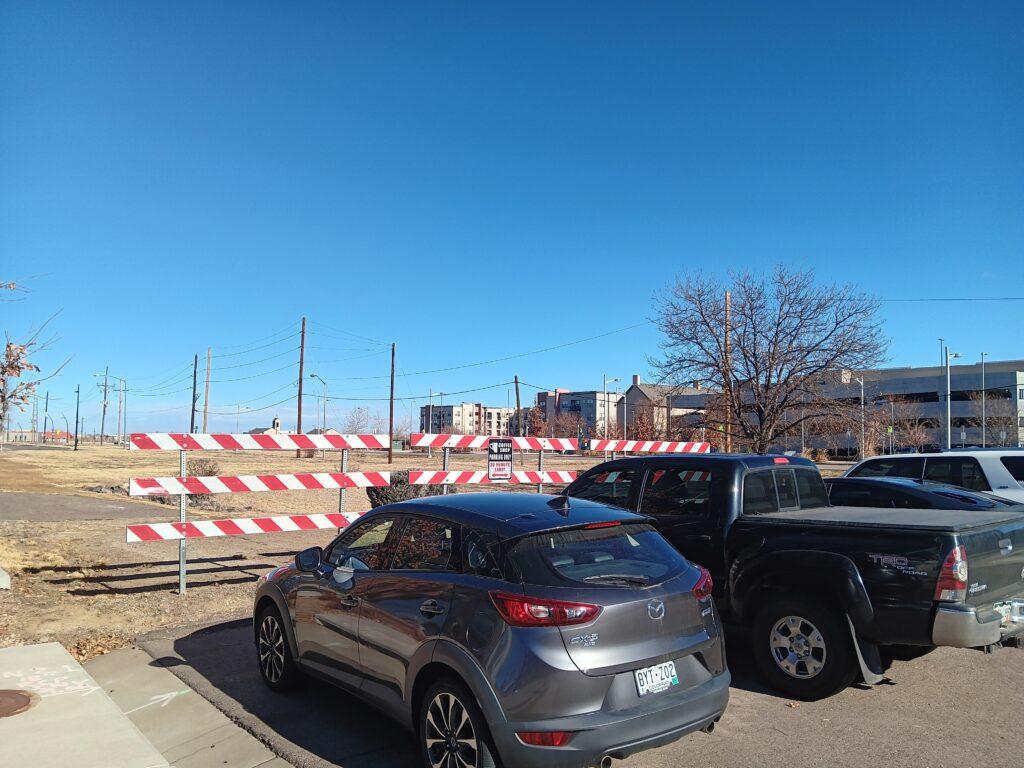 a photo of several cars in a very small parking area