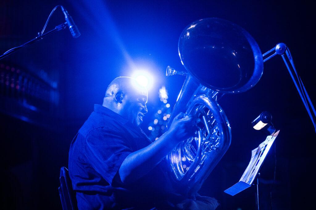 CPR Classical host Kabin Thomas plays his tuba at the Colorado Matters Holiday Extravaganza