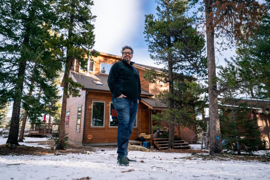 Darrin Harris Frisby outside his Nederland home