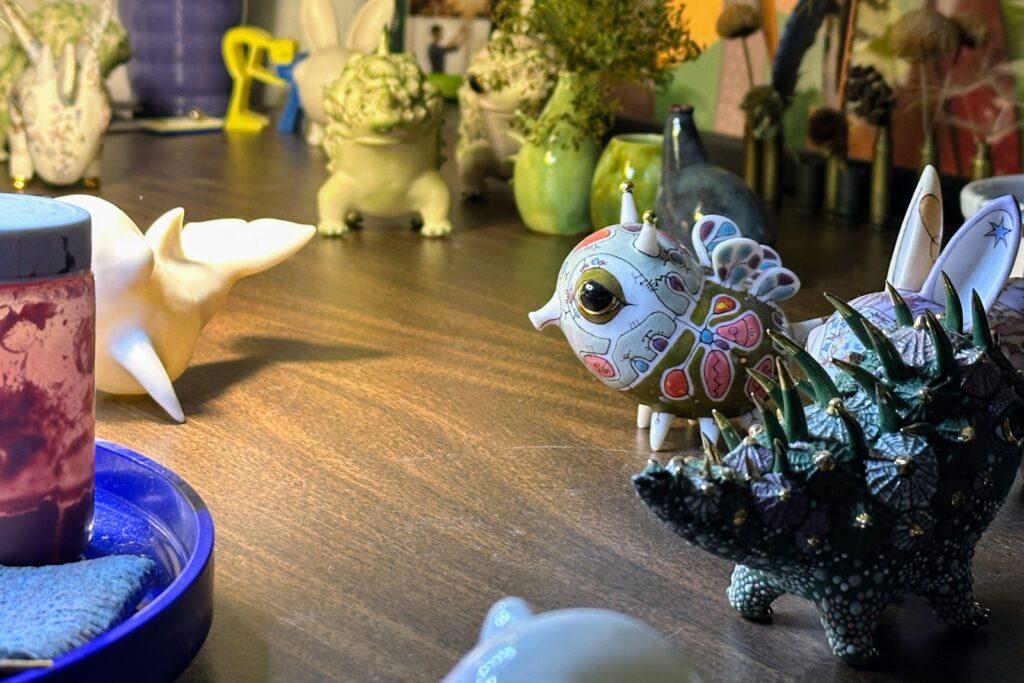 A desk with porcelain figurines