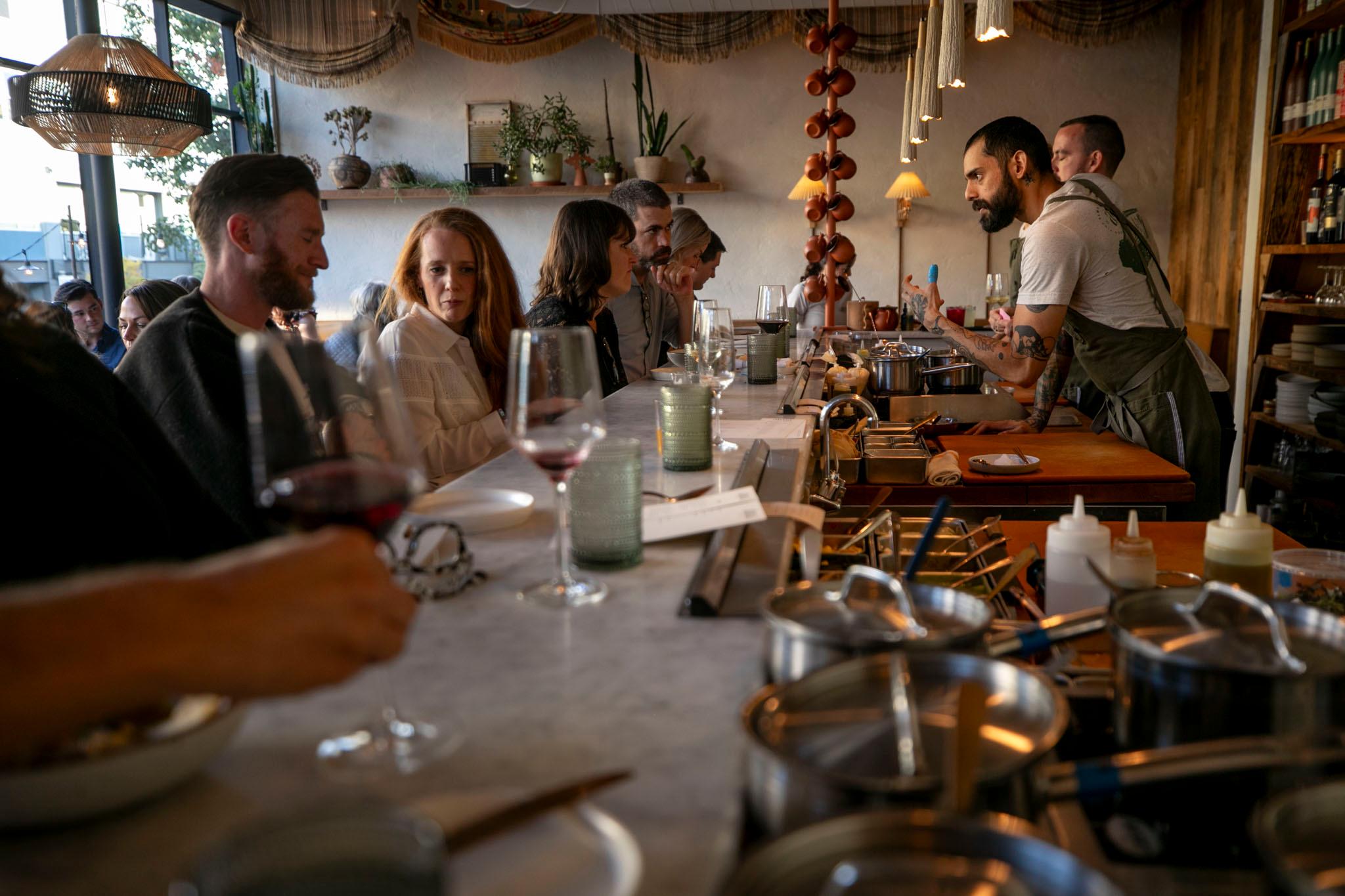 Alma Fonda Fina's Highland during a dinner rush customers sitting at the counter