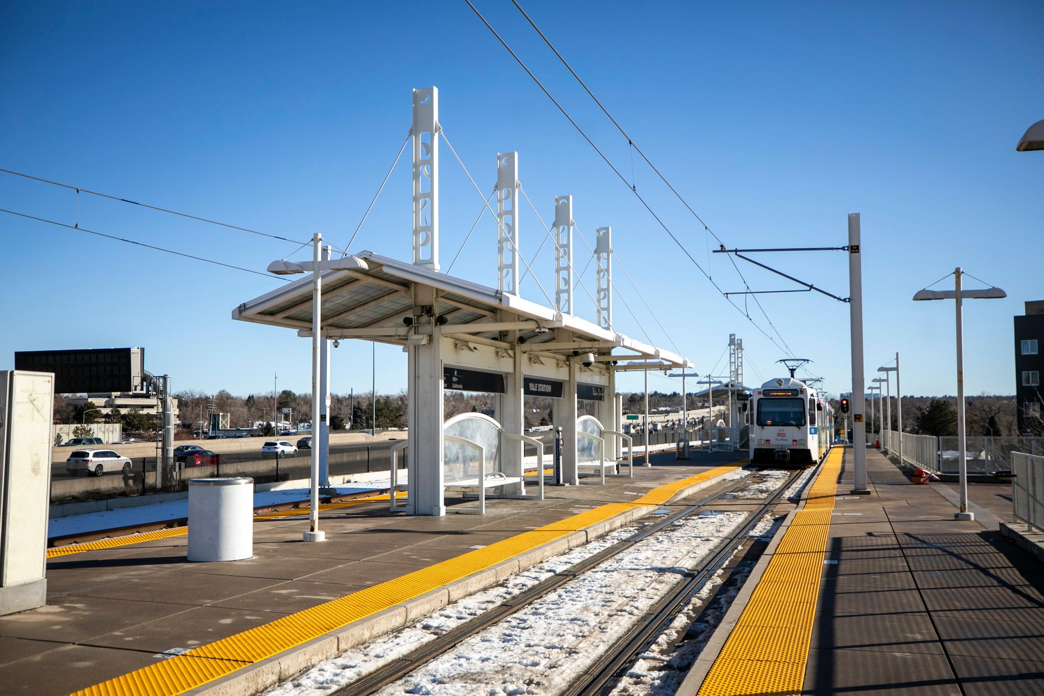 RTD train departs from the Yale Avenue station