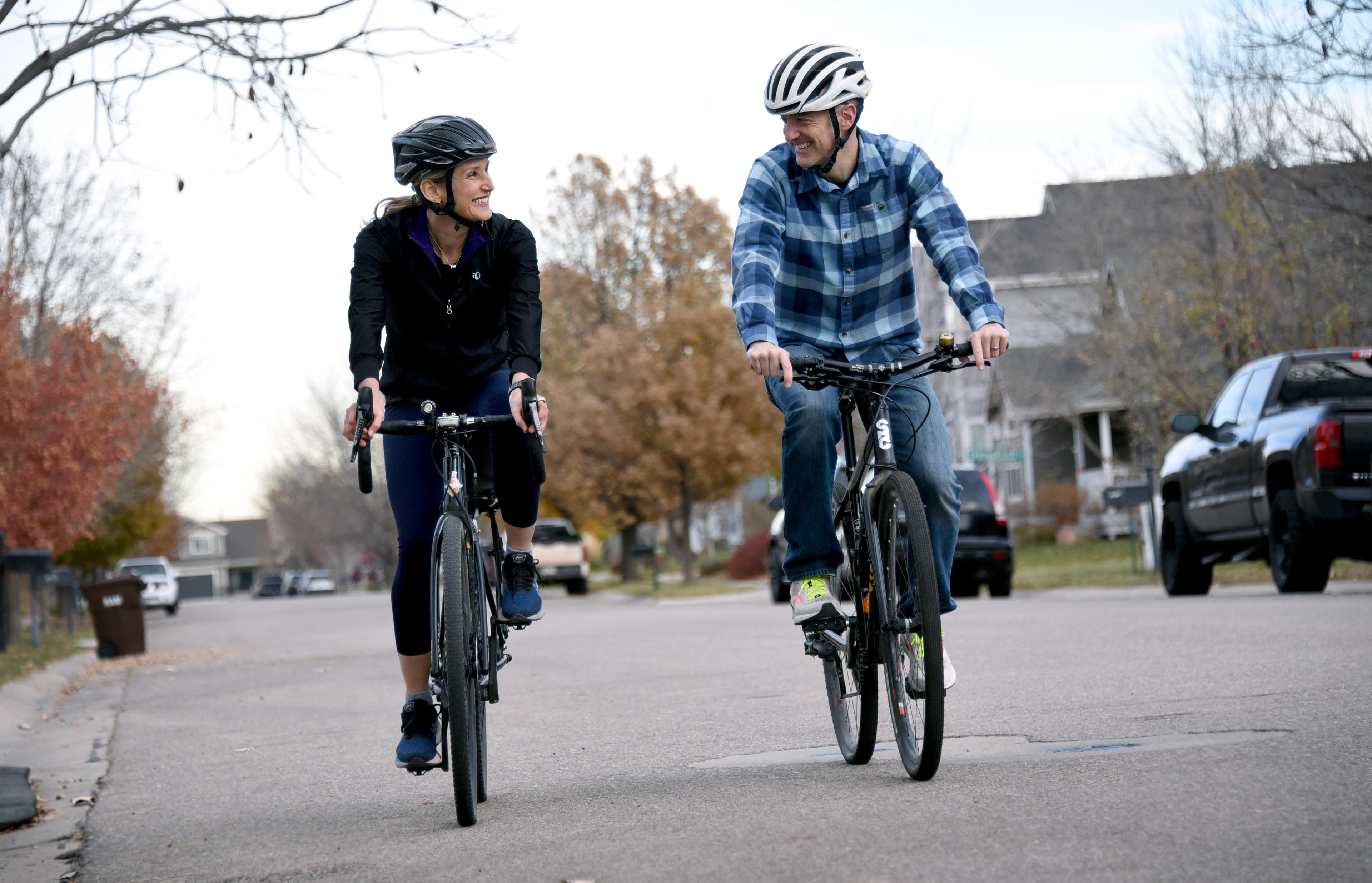 Liver donor riding bike with husband.