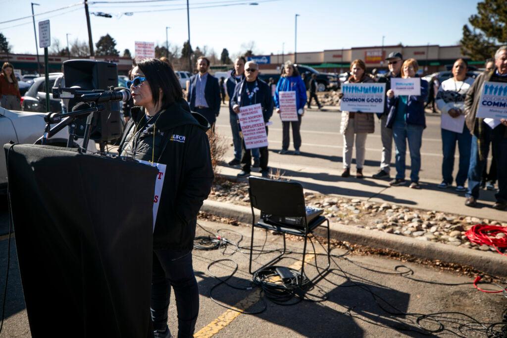 Kim Cordova speaks outside a King Soopers