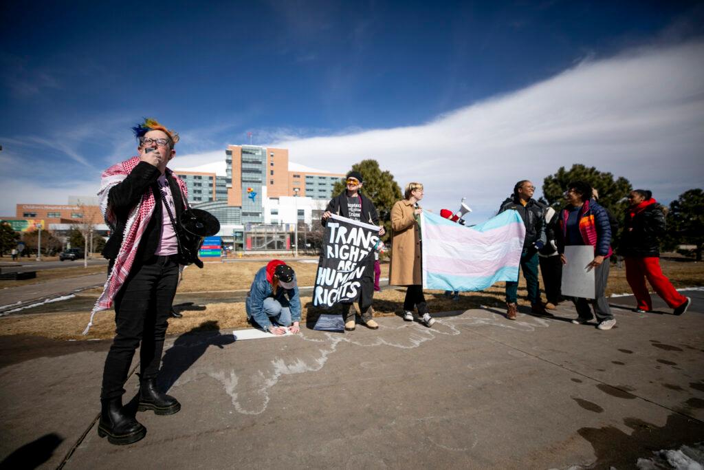 Z Williams leads a protest outside Children's Hospital