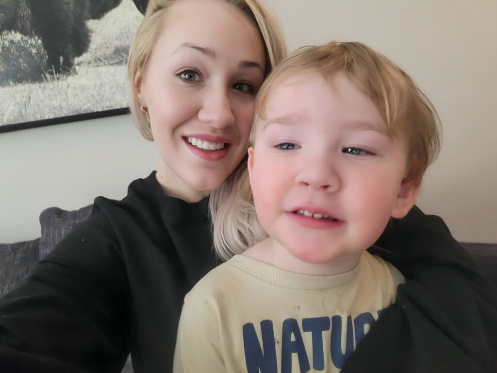 A portrait of a boy with his mother.