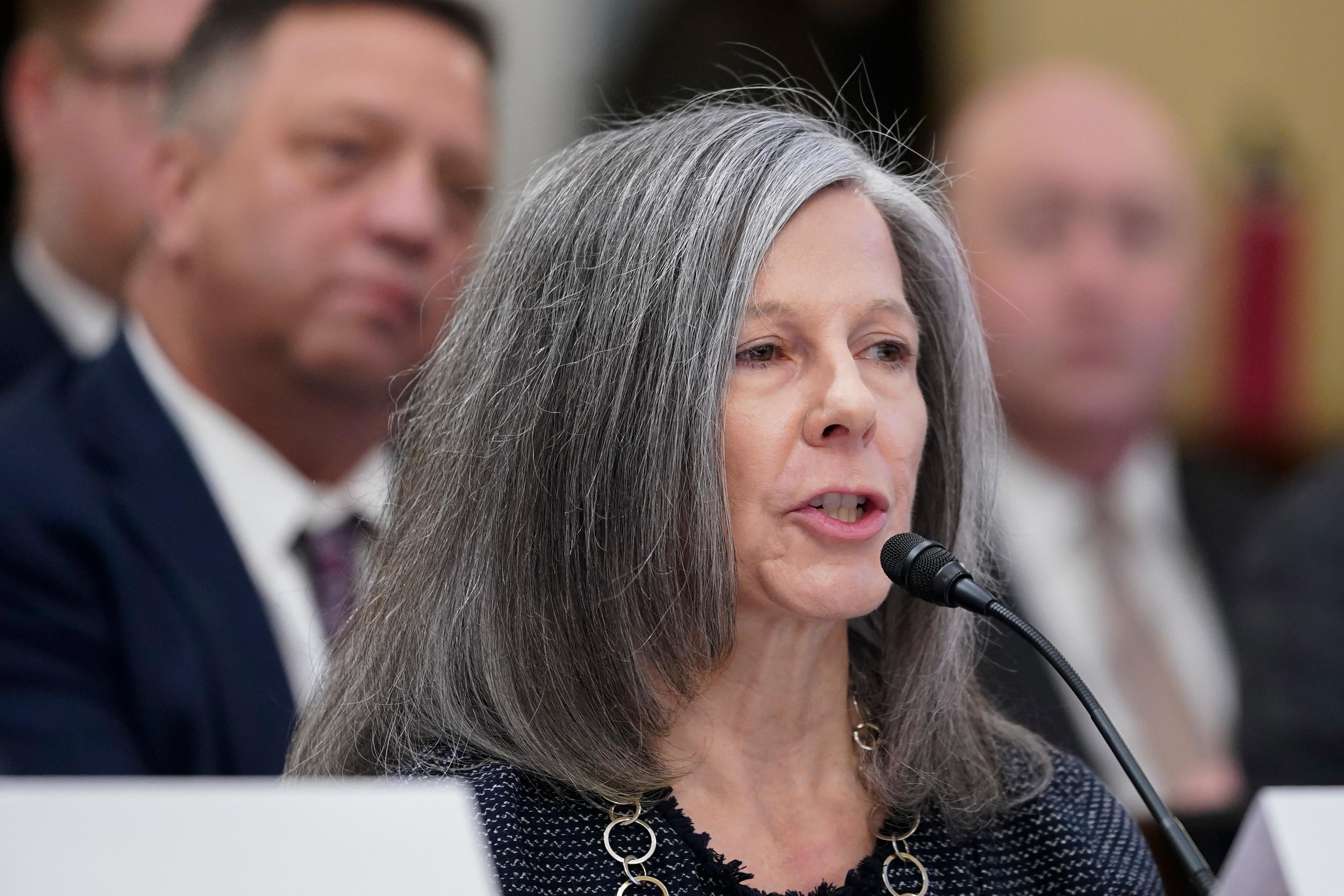 Kathleen Sgamma, President, Western Energy Alliance, sits in front of a small microphone at a Congrssional hearing table.