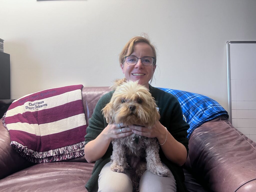 Freshman Republican Rep. Dusty Johnson and her dog,