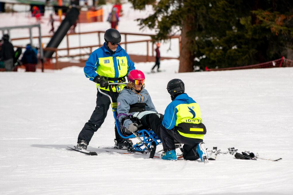 Ignite athlete Noah Palmer, who is blind, skis at Eldora guided