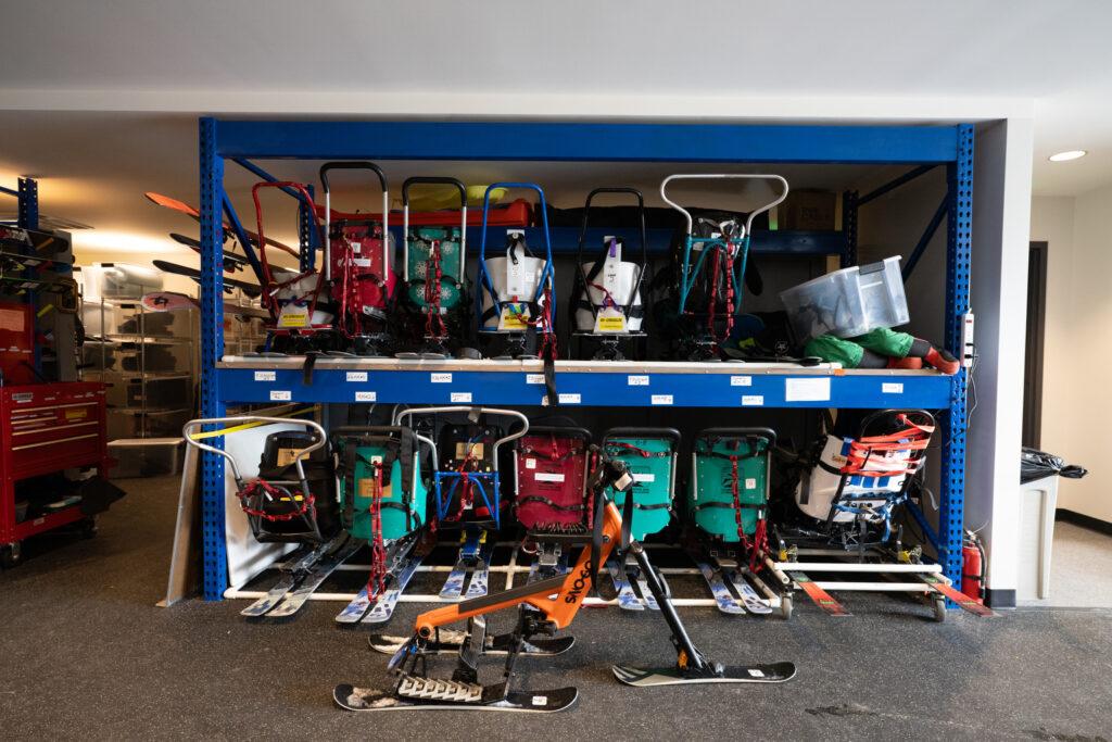 All manner of sleds and snow bikes for Ignite athletes who can’t use their legs, stored at the organization’s headquarters at Eldora