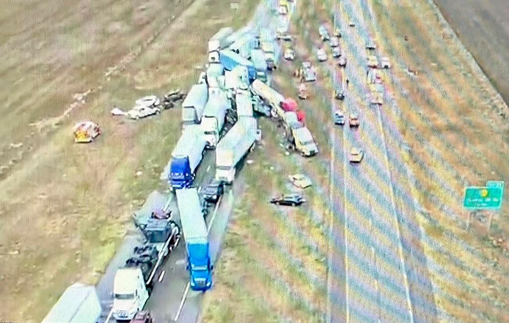 Trucks piled up on Interstate 70 after a dust storm in Kansas