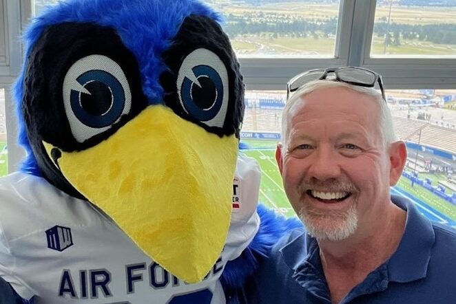 Tom Bailey posing with Air Force Academy mascot, "The Bird"