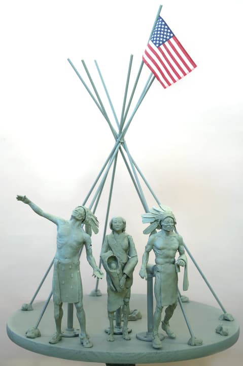 A clay model of people standing